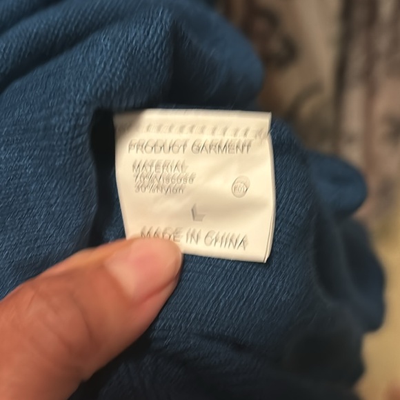 Mid Length on  5’ 6”. Stretchy but form fitting.  Blue sweater dress - Picture 7 of 7